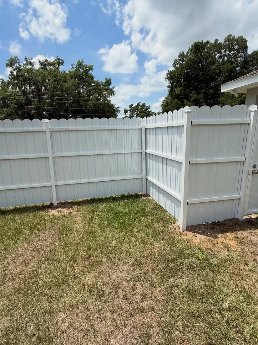 White vinyl scalloped fence corner section